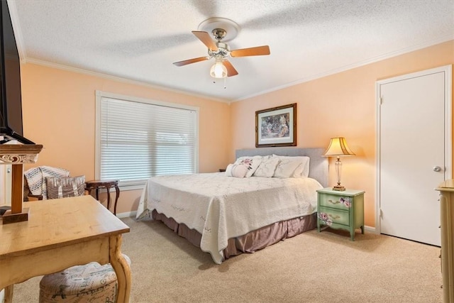 bedroom with light carpet, a textured ceiling, ornamental molding, and a ceiling fan