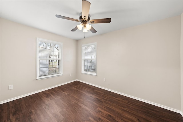 2713 Woodrow St, Waco, TX 76708 - empty room featuring dark wood-type flooring, baseboards, and ceiling fan