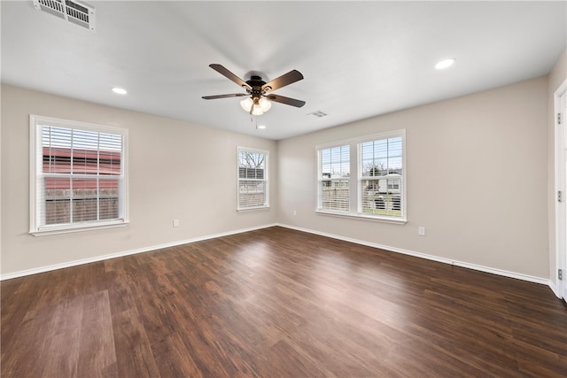 2713 Woodrow St, Waco, TX 76708 - empty room featuring a ceiling fan, dark wood-style flooring, baseboards, and recessed lighting