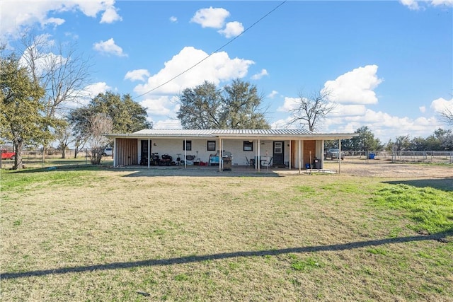 2386 Flat Rock Rd, Waco, TX 76708 - ranch-style house featuring metal roof, a patio, a front yard, and fence