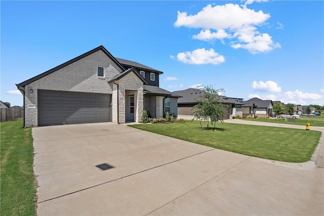 9929 Bridlewood Ln, Waco, TX 76708 - view of front of property with a garage, stone siding, concrete driveway, and a front lawn