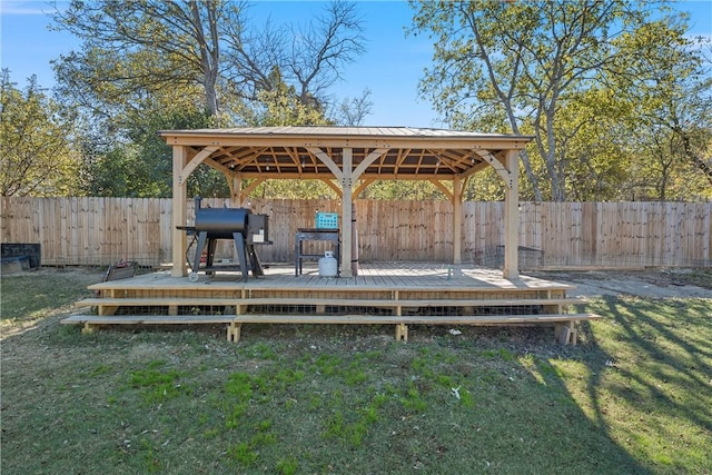 511 N Abbott St, Hillsboro, TX 76645 - wooden terrace featuring a gazebo, a yard, and a fenced backyard