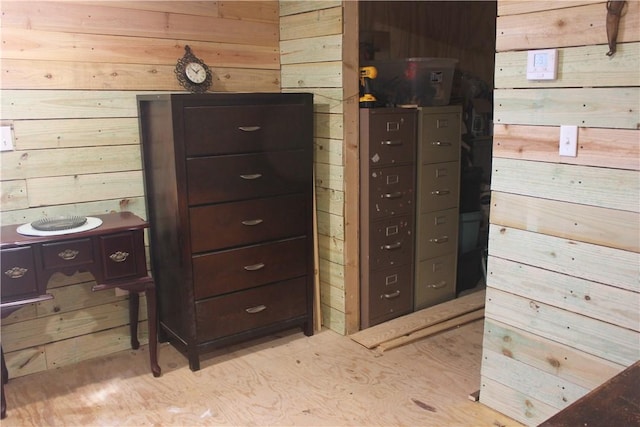 interior space featuring wood walls