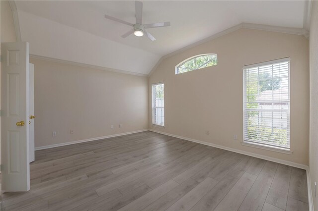 1110 Springhill St, Waco, TX 76705 - empty room featuring lofted ceiling, wood finished floors, a ceiling fan, and baseboards