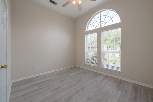 1110 Springhill St, Waco, TX 76705 - empty room with visible vents, baseboards, ceiling fan, ornamental molding, and light wood-style flooring