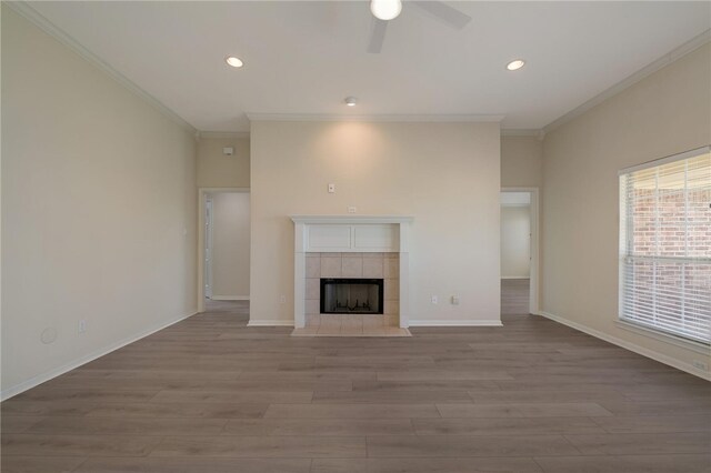 1110 Springhill St, Waco, TX 76705 - unfurnished living room featuring wood finished floors, ornamental molding, and a ceiling fan
