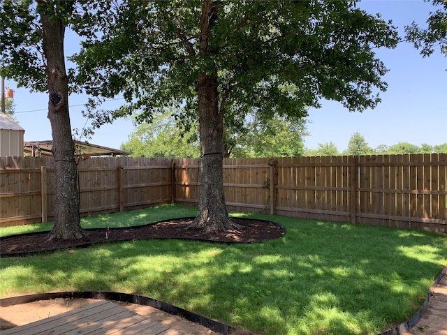 707 Cherry Dr, Groesbeck, TX 76642 - view of yard with a wooden deck