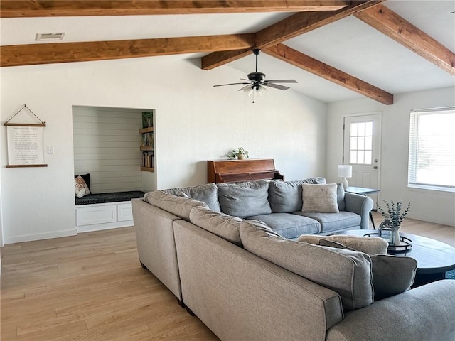 living room featuring visible vents, vaulted ceiling with beams, baseboards, ceiling fan, and light wood-type flooring