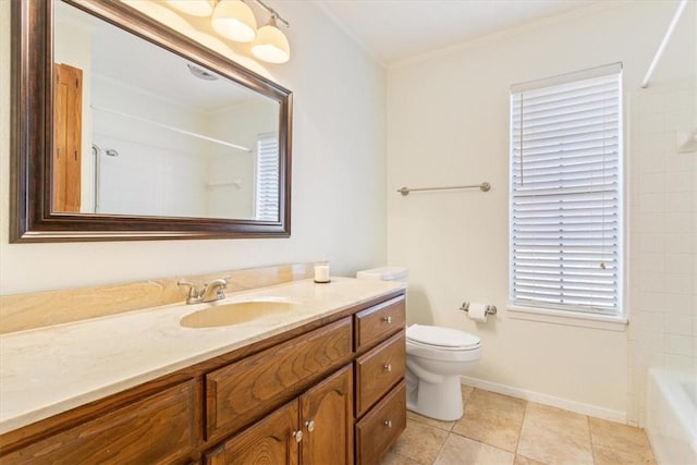 bathroom with toilet, baseboards, tile patterned flooring, crown molding, and vanity