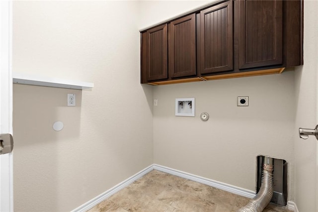 laundry room featuring cabinet space, electric dryer hookup, gas dryer hookup, and baseboards