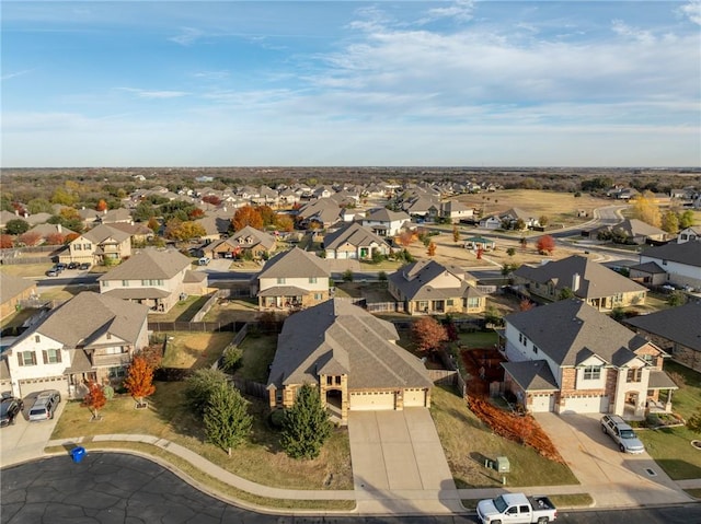 birds eye view of property with a residential view