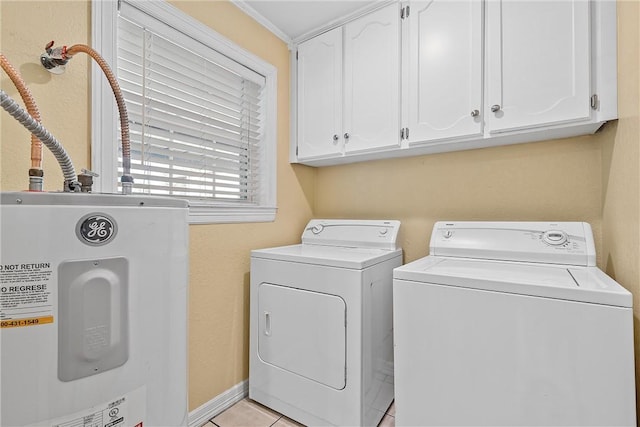 103 Spring Lake Dr, Waco, TX 76705 - laundry area with water heater, independent washer and dryer, cabinet space, and light tile patterned floors