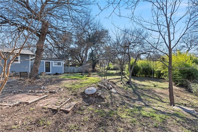view of yard featuring fence