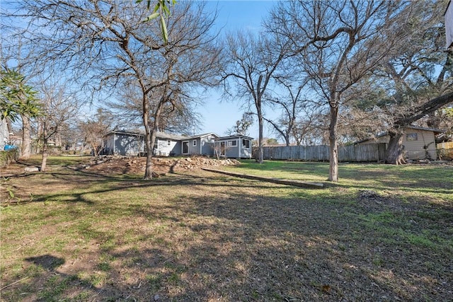 view of yard with fence
