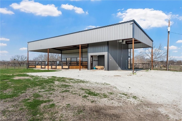 view of outdoor structure featuring an exterior structure and an outbuilding