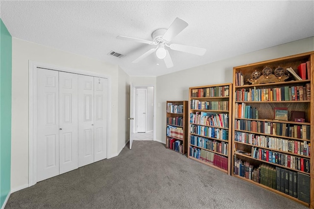 301 Whispering Meadows Dr, Hewitt, TX 76643 - sitting room featuring carpet floors, a ceiling fan, and a textured ceiling