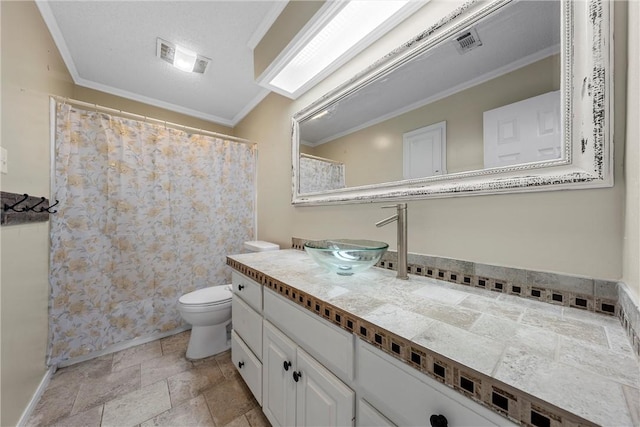 301 Whispering Meadows Dr, Hewitt, TX 76643 - full bathroom featuring vanity, stone finish flooring, toilet, crown molding, and baseboards