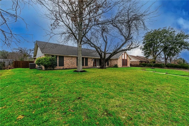 640 Ivy Ann Dr, Woodway, TX 76712 - view of yard featuring cooling unit and fence