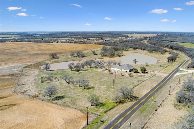 birds eye view of property featuring a rural view