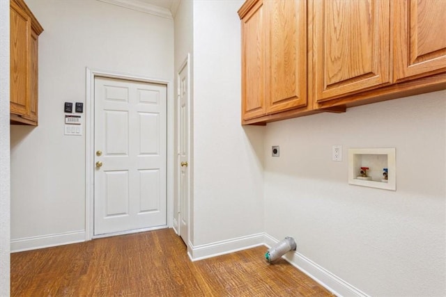 laundry area featuring baseboards, dark wood finished floors, washer hookup, cabinet space, and electric dryer hookup