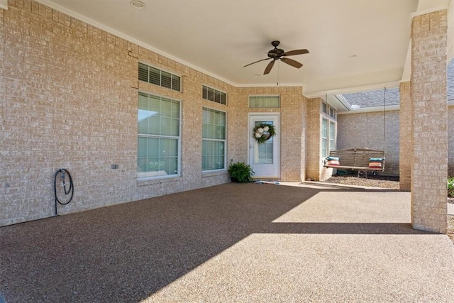 view of patio / terrace with a ceiling fan
