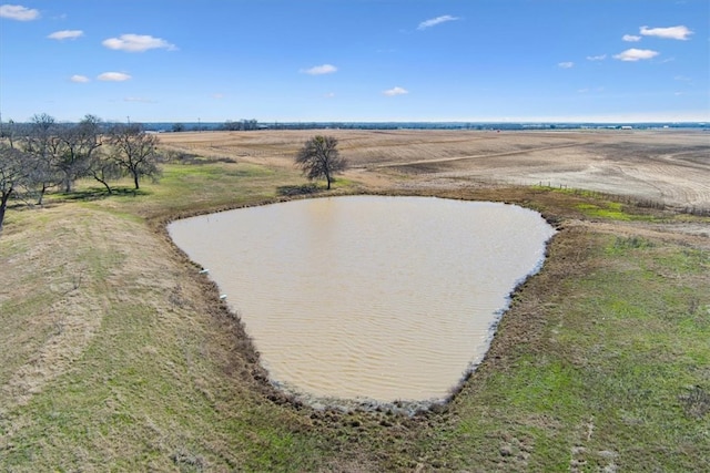 bird's eye view with a water view and a rural view