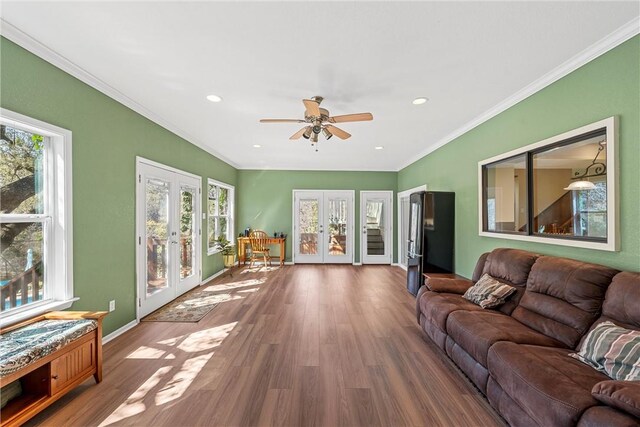 1016 Cardinal Dr, Woodway, TX 76712 - living area with french doors, a ceiling fan, wood finished floors, ornamental molding, and recessed lighting