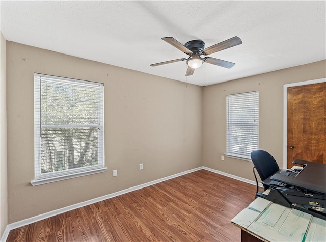 1016 Cardinal Dr, Woodway, TX 76712 - office space featuring plenty of natural light, ceiling fan, and wood finished floors