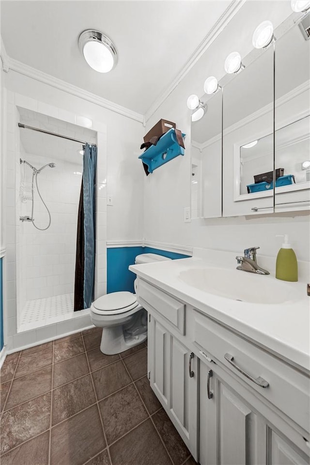 1016 Cardinal Dr, Woodway, TX 76712 - bathroom featuring toilet, vanity, a shower stall, and ornamental molding