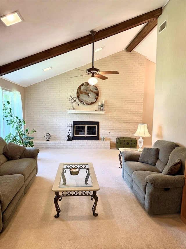 1016 Cardinal Dr, Woodway, TX 76712 - living room with ceiling fan, brick wall, carpet, and a brick fireplace
