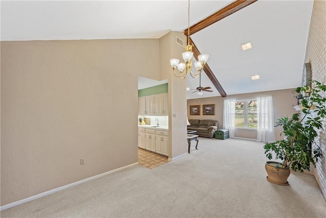 1016 Cardinal Dr, Woodway, TX 76712 - living area with light carpet, a chandelier, baseboards, high vaulted ceiling, and ceiling fan