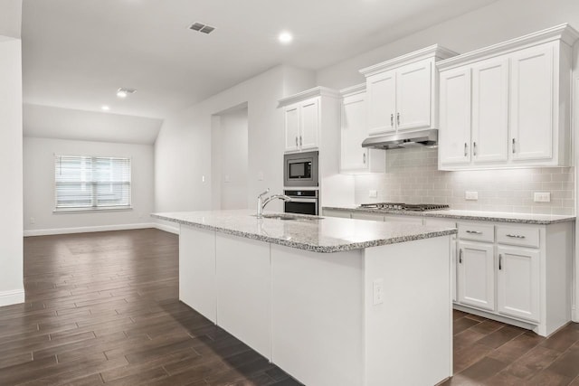 429 Cooper St, Argyle, TX 76226 - kitchen with visible vents, dark wood-type flooring, under cabinet range hood, and white cabinets