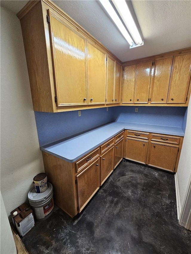 1596 Lcr 800, Groesbeck, TX 76642 - kitchen with light countertops and unfinished concrete flooring