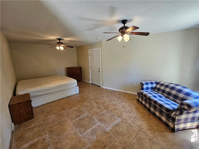 1596 Lcr 800, Groesbeck, TX 76642 - bedroom featuring ceiling fan and baseboards