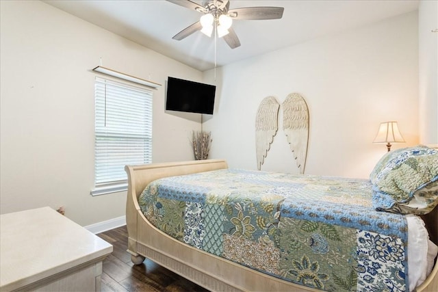 107 Indian Trails Rd, Riesel, TX 76682 - bedroom featuring dark wood finished floors, a ceiling fan, and baseboards