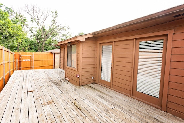 4020 River Oaks Cir, Temple, TX 76504 - deck with a fenced backyard and a gate