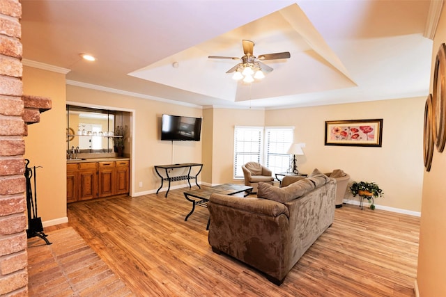 4020 River Oaks Cir, Temple, TX 76504 - living area featuring a tray ceiling, light wood-type flooring, a ceiling fan, baseboards, and recessed lighting