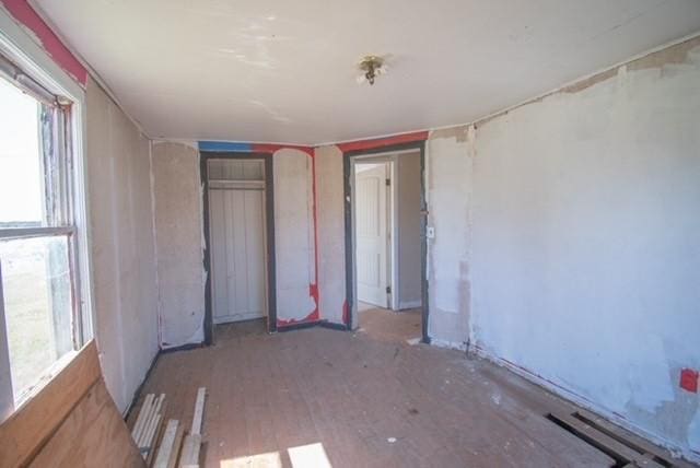 unfurnished bedroom with a closet