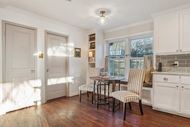 245 Broughton Dr, Woodway, TX 76712 - sitting room featuring baseboards, dark wood-style floors, and crown molding