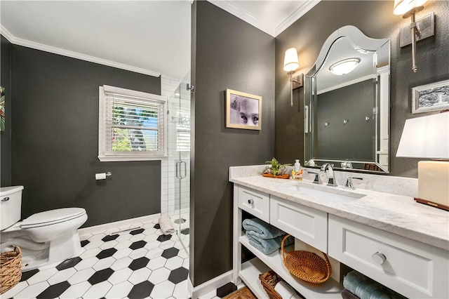 full bathroom featuring vanity, baseboards, ornamental molding, a shower stall, and toilet