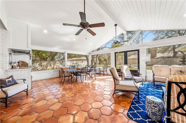 sunroom featuring recessed lighting, vaulted ceiling with beams, outdoor dining area, and ceiling fan