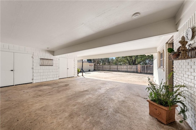 garage featuring fence
