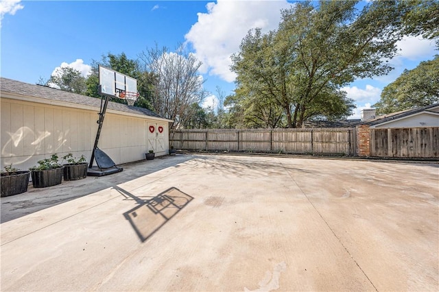 view of patio featuring fence