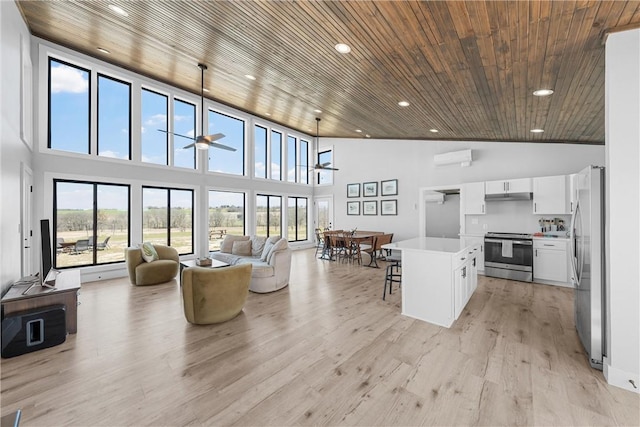 living room featuring recessed lighting, high vaulted ceiling, light wood-style flooring, and wooden ceiling