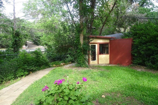 411 Brookwood Dr, Woodway, TX 76712 - view of grassy yard with an outbuilding