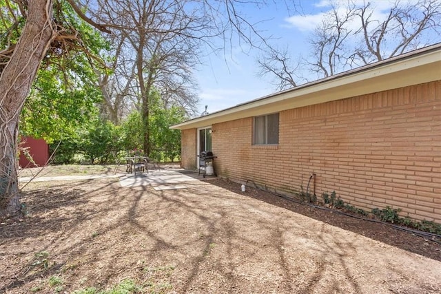 view of yard with a patio area