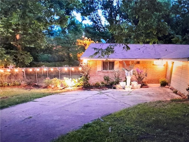 back of house featuring fence