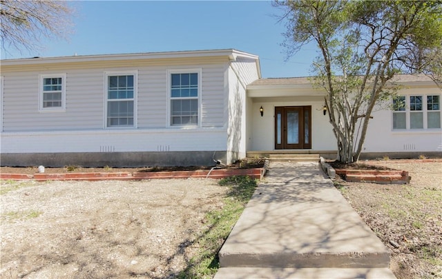 view of front of house with crawl space