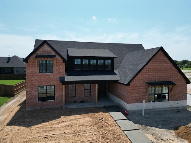 14000 Rw Ct, Woodway, TX 76712 - view of front of property featuring brick siding and roof with shingles