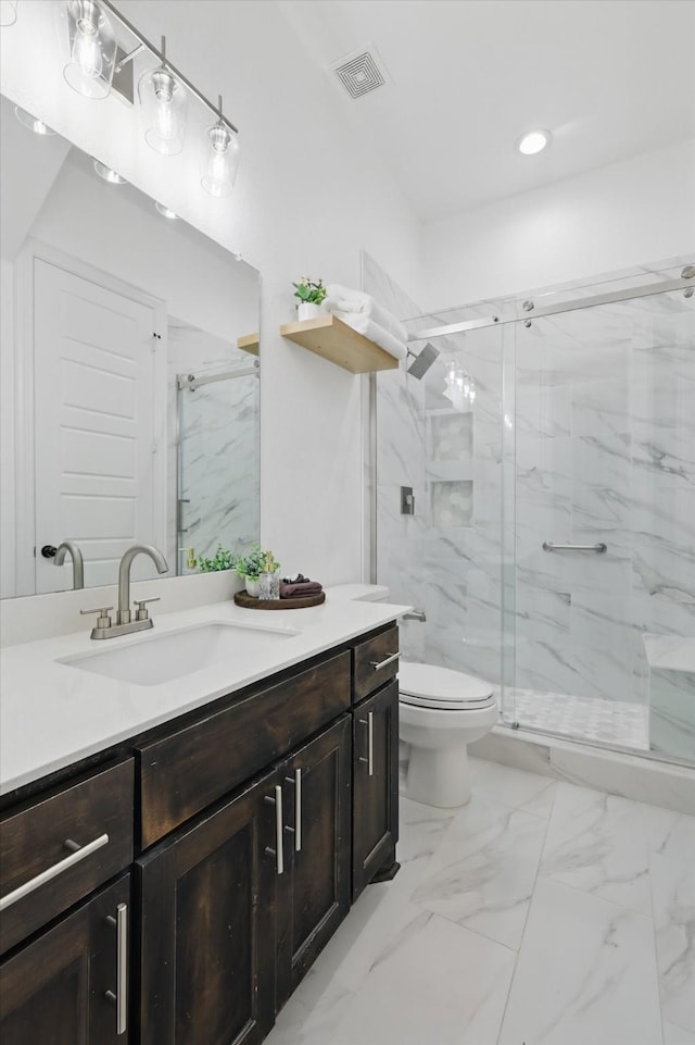 full bathroom featuring visible vents, a marble finish shower, and toilet